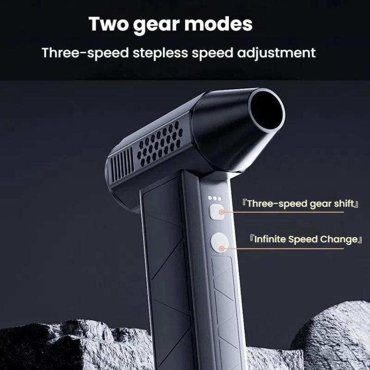 High-speed cordless air duster blowing dust off a laptop keyboard – eco-friendly alternative to canned air